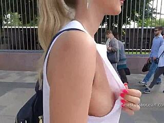Natural tits bounce as Russian girl flashes in public