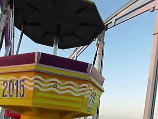 Teen milf gives a risky public double blowjob on a Ferris wheel