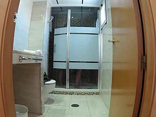 Madama satisfies herself with a shower and her big ass