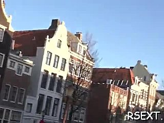 Naughty blonde gets seduced and fucked in the redlight district of Amsterdam