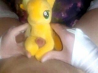 My little pony Applejack learns the art of a handjob in this video