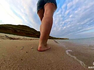 Explore the sandy shores with my bare feet