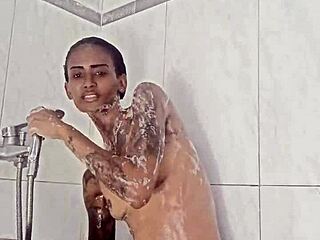 Amateur ebony babe enjoys a shower solo