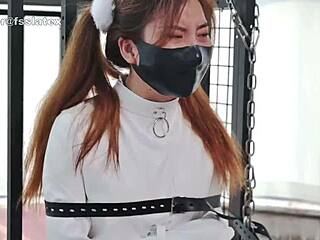 Japanese babe in latex catsuit gets tied up